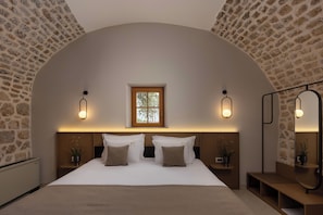 Suite familiar | Ropa de cama de alta calidad, minibar, caja fuerte
