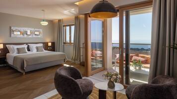 Superior Suite | Premium bedding, minibar, in-room safe, blackout drapes