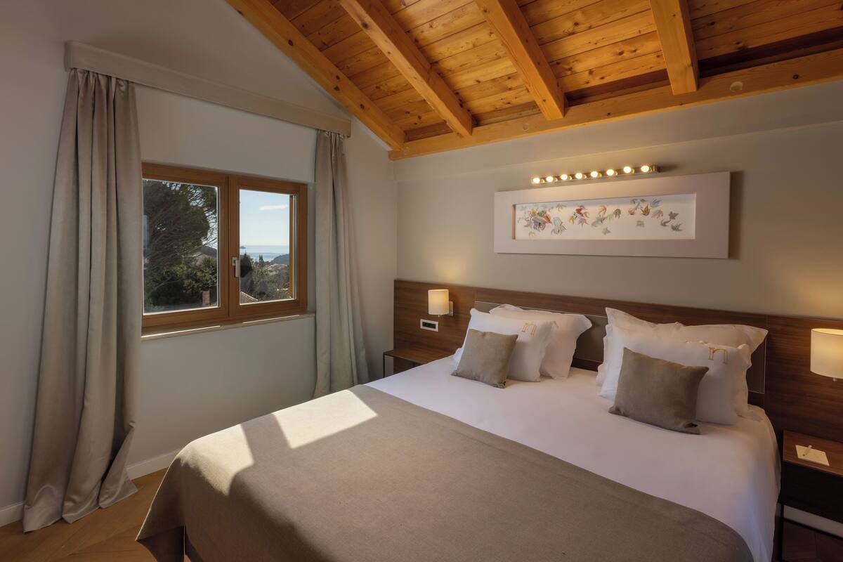 Suíte standard | Roupas de cama premium, frigobar, cofres nos quartos, cortinas blackout