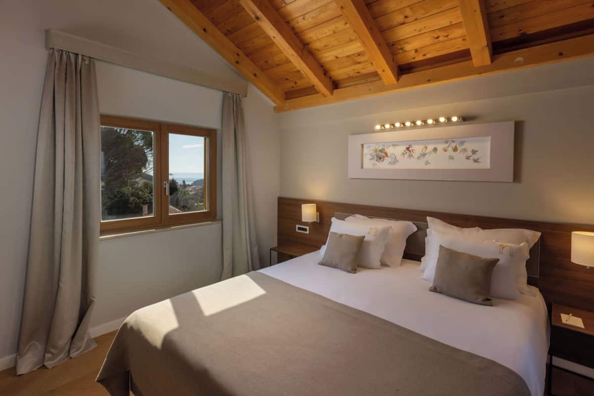 Standaard suite | 1 slaapkamer, luxe beddengoed, een minibar, een kluis op de kamer
