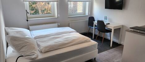 City Double or Twin Room (32) | Down comforters, desk, travel crib, free WiFi