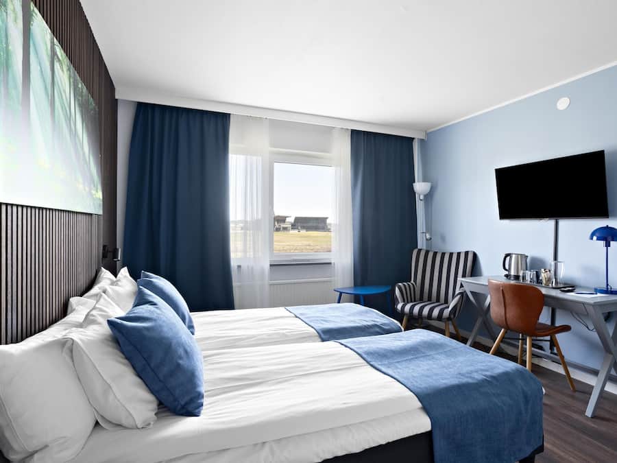 Desk, laptop workspace, free WiFi, bed sheets