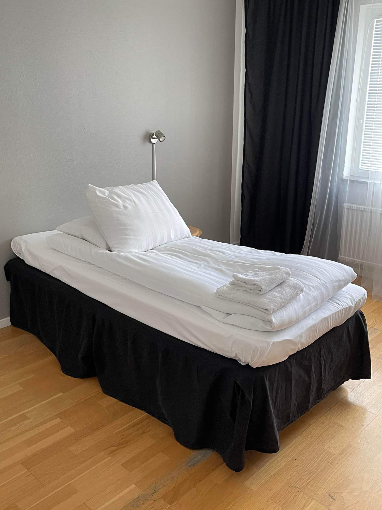 Desk, laptop workspace, free WiFi, bed sheets