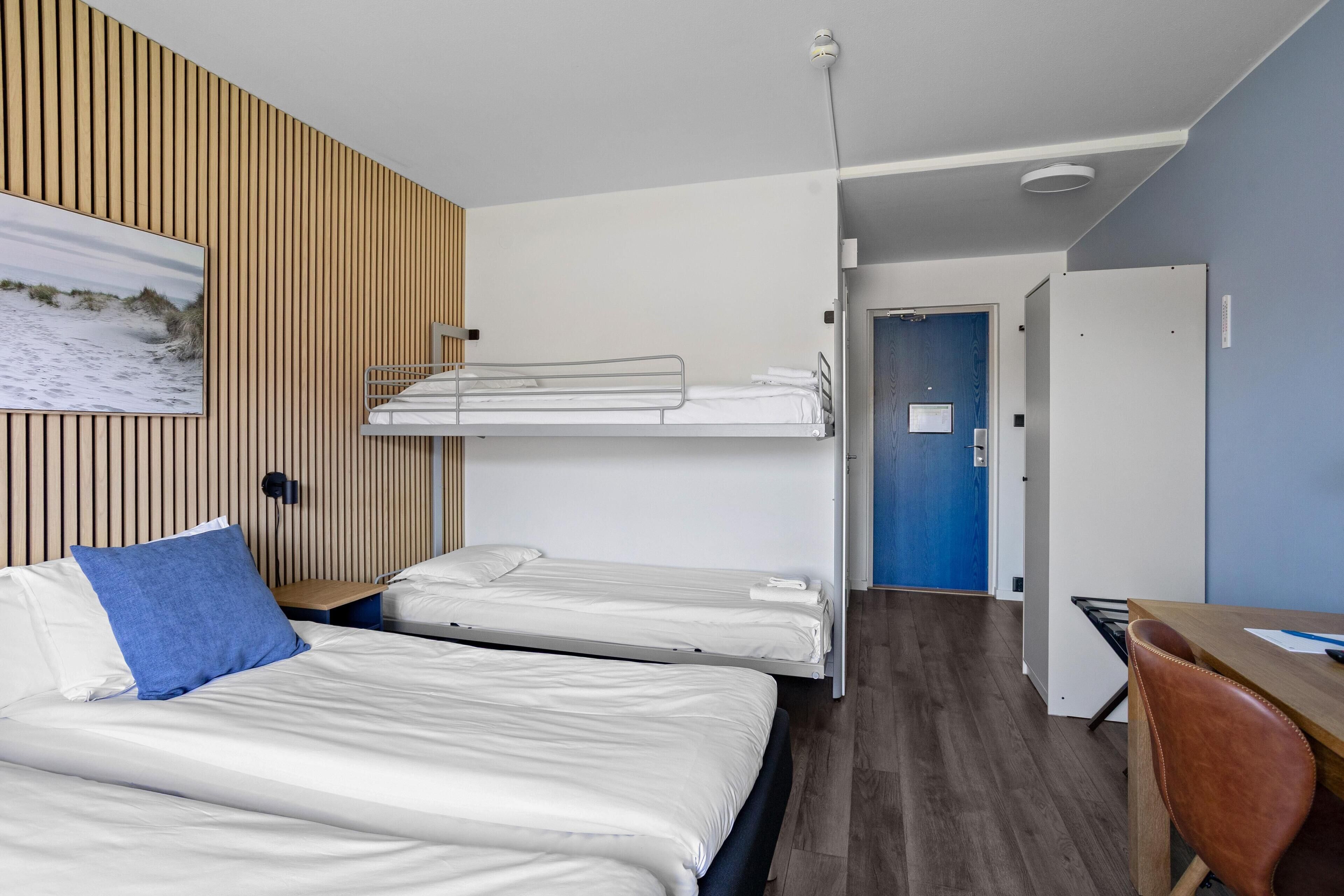 Family Room, Multiple Beds, Non Smoking | Desk, laptop workspace, free WiFi, bed sheets