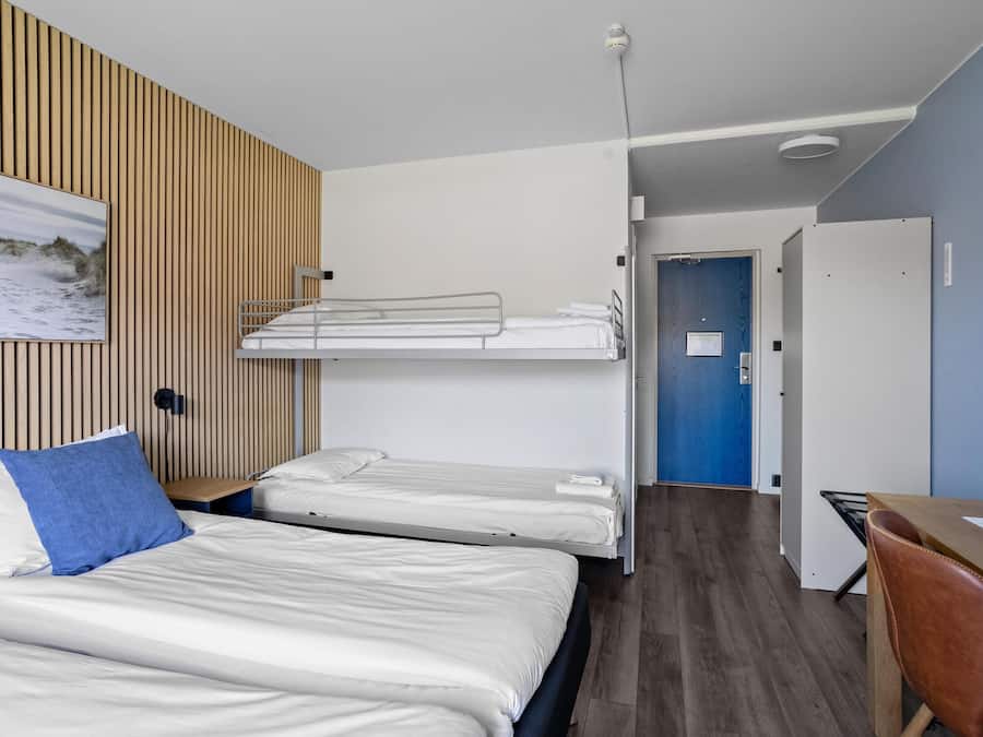 Desk, laptop workspace, free WiFi, bed sheets
