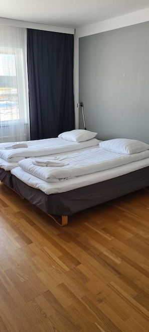 Desk, laptop workspace, free WiFi, bed sheets