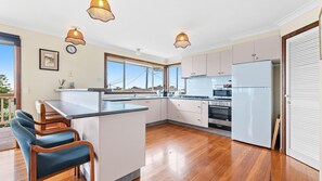 Microwave, oven, cookware/dishes/utensils, dining tables