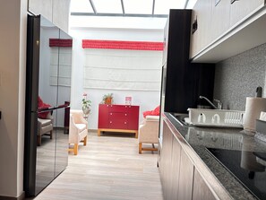 Fridge, microwave, stovetop, coffee/tea maker