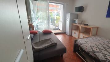 Fer et planche Ă repasser, draps fournis