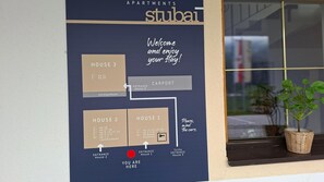 A room layout poster for a hotel with three houses, a carport, and a garbage room. - Apartment Neustift Near Stubai Glacier (Neustift Im Stubaital)