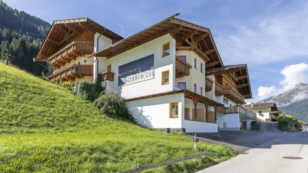 A traditional chalet-style building with a sign reading "Stuba". - Apartment in Neustift Near Ski Lift (Neustift Im Stubaital)