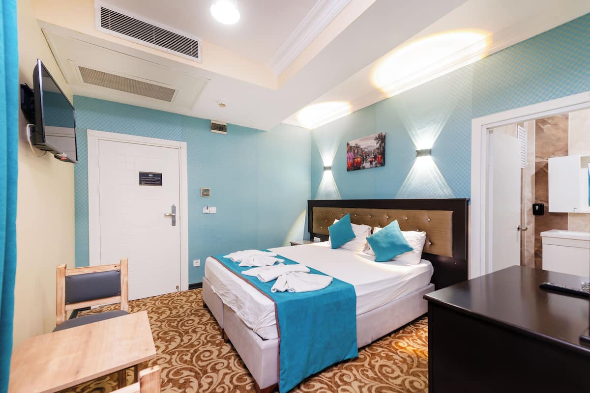 Kamar Double atau Twin Standar | Seprai katun Mesir, seprai premium, dan bantalan ekstra lembut