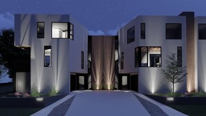 A modern building with a central entrance, large windows, and a starry night sky.