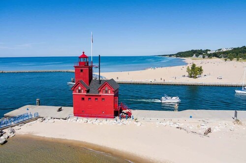 Luxe Downtown Holland 2BR Condo • Walkable • Parking + Gym