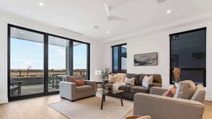 Living area - Luxe Downtown Holland 2BR Condo • Walkable • Parking + Gym (Holland)