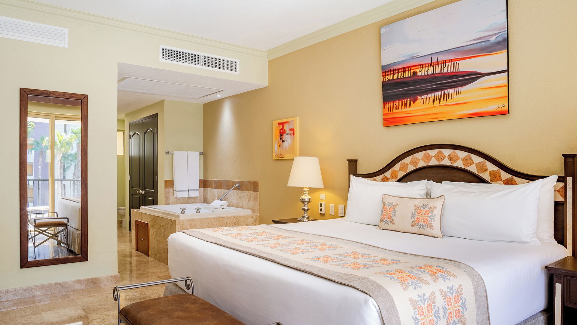 Premium bedding, down duvets, free minibar items, in-room safe