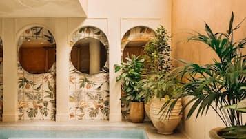 Indoor pool, open 6:00 AM to 10:00 PM, pool loungers