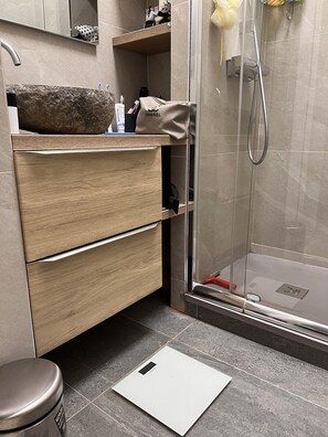 Shower, hair dryer, towels, soap
