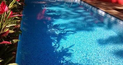 House on Camburi beach in gated community with heated pool