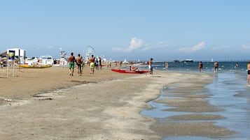 Private beach nearby, white sand, 3 beach bars