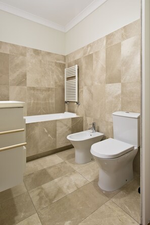 Hair dryer, bidet, towels, soap