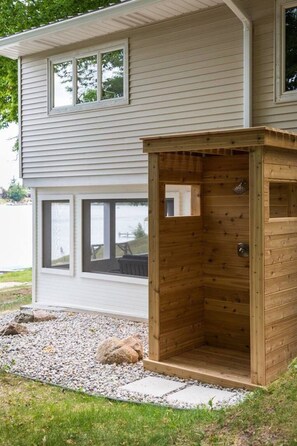 Property grounds - Tucked down a long dirt drive, this property is private, serene & has an awesome beach front! (Traverse City)