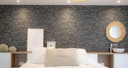 Les pieds dans le sable