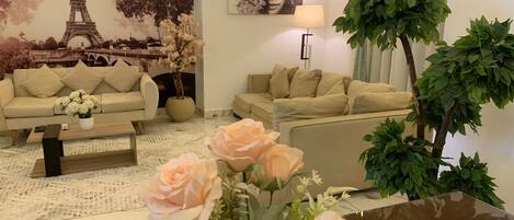 Grand Apartment | Living area | 55-inch Smart TV with satellite channels, TV