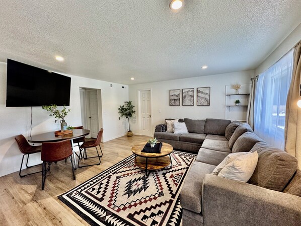 Deluxe Apartment, 3 Bedrooms | Living area