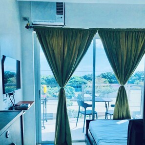 1 bedroom, in-room safe, free WiFi, bed sheets - Samboy Condo unit besides SM Mall uptown (Cagayan de Oro)