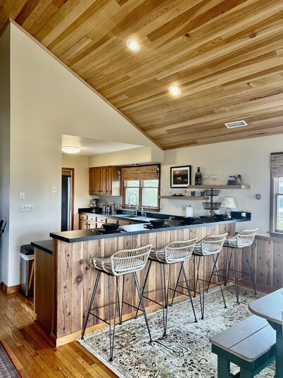 Three-bedroom house with views, decks, golf cart and home gym!