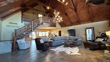 Smart TV, fireplace, books, printers
