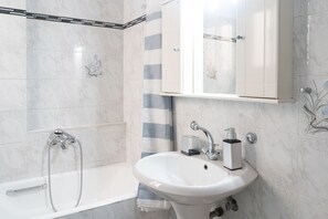 Hair dryer, towels, toilet paper