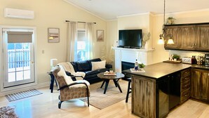 Rom – royal, ikke-røyk, byutsikt | Oppholdsområde | En 40-tommers Flatskjerm-TV med kabel-kanaler samt TV