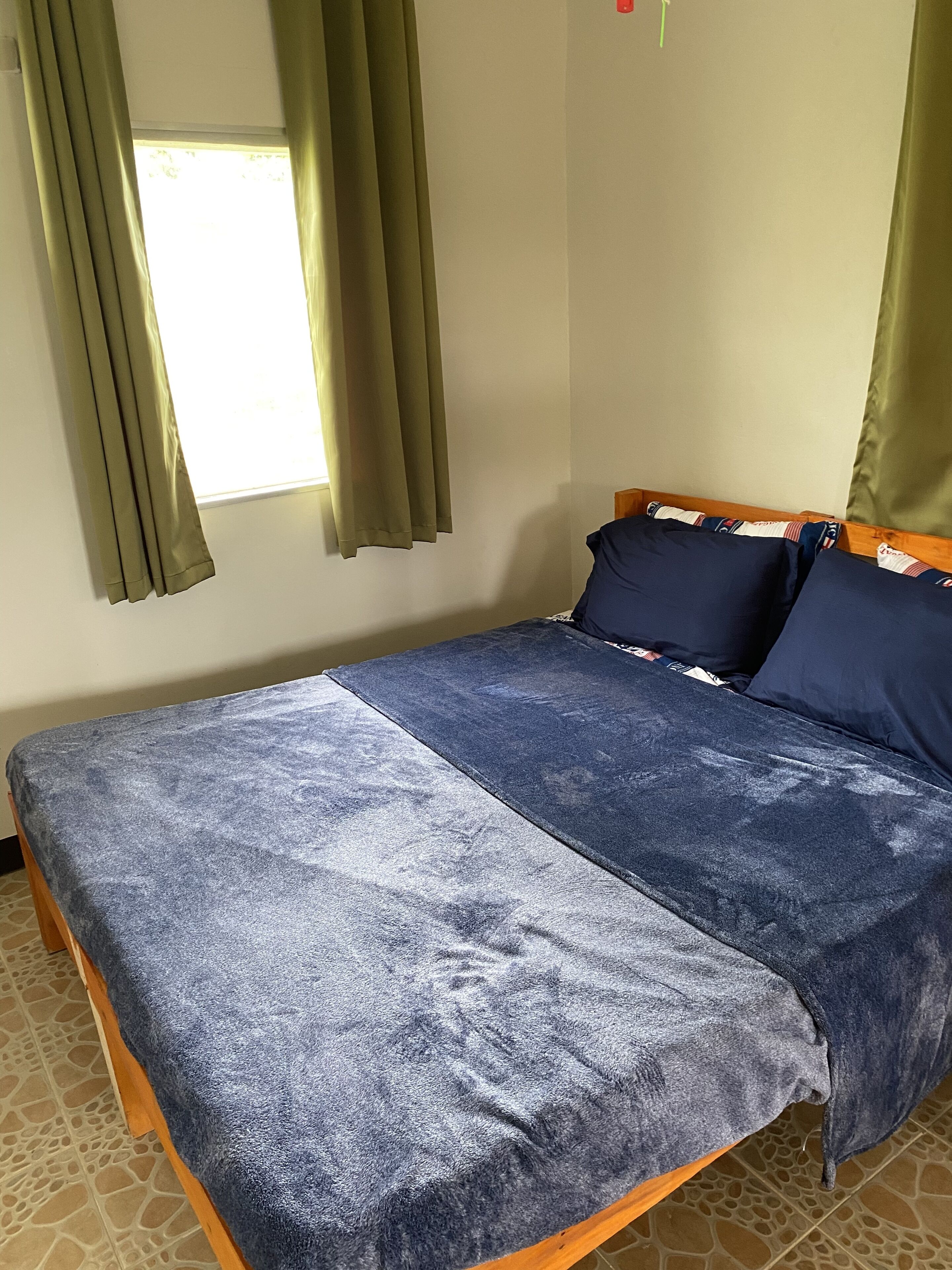 2 bedrooms, laptop workspace, blackout drapes, soundproofing