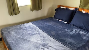 2 bedrooms, laptop workspace, blackout drapes, soundproofing