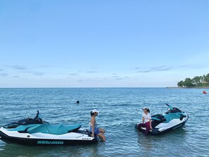 On the beach, white sand, water skiing, kayaking