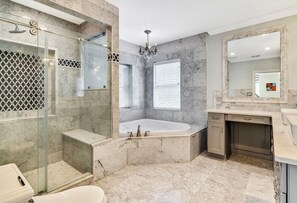 Jetted bath, hair dryer, bidet, towels