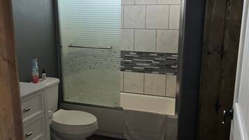 Hair dryer, towels, soap, shampoo