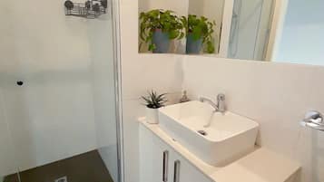 Shower, hair dryer, towels, soap