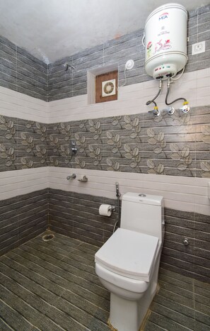 Dusj, håndklær, såpe og sjampo