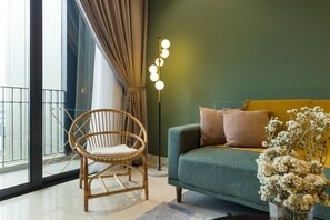 Signature 2 Bedroom | Living area | 40-inch Smart TV with cable channels, TV, Netflix - ViiA Residences in KL Eco City, Five Senses (Kuala Lumpur)