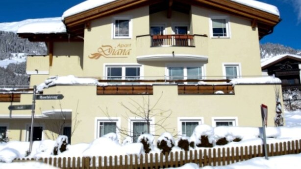 A two-story building with a sign reading "Apart Diana." - Inviting Apartment in Fiss in the Mountains (Fiss)