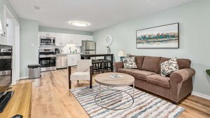 TV, fireplace - The Nordic - Central Collingwood Condo (Collingwood)
