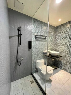 Panoramic Quadruple Room, 2 Queen Beds, Non Smoking, Ocean View | Bathroom | Shower, eco-friendly toiletries, hair dryer, slippers