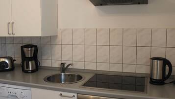 Apartemen | Dapur pribadi | Kompor, mesin pencuci piring, dan mesin pembuat kopi/teh
