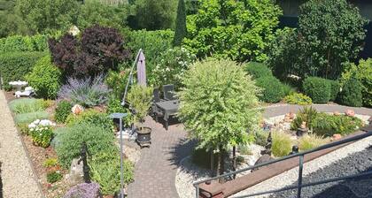 Garden Retreat With Pond View