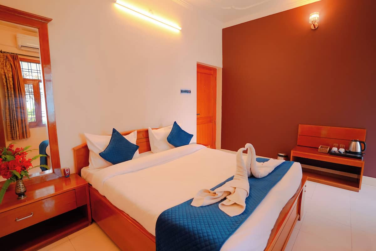 Rideaux occultants, fer et planche à repasser, Wi-Fi gratuit