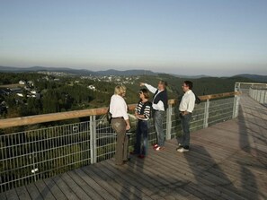 Guests can enjoy panoramic views of the surrounding town and rolling hills from this elevated observation deck.