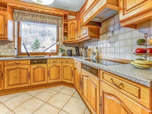 Apartment | Private kitchen | Stovetop, highchair